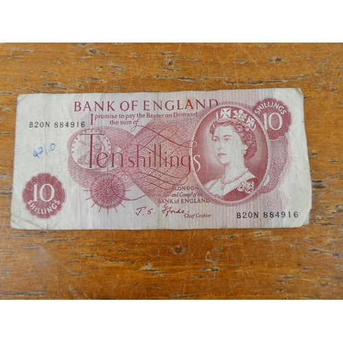 315 - Two Bank of England Ten Shilling notes.