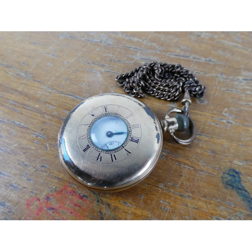 334 - A antique pocket watch and chain and more.