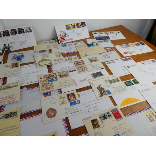 348 - A lot of first day covers, postcards and more.