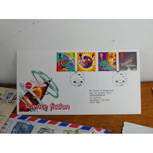 348 - A lot of first day covers, postcards and more.