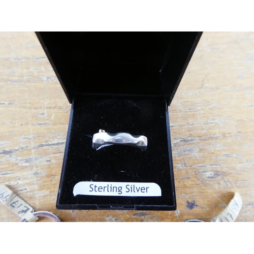 358 - Three sterling silver rings.