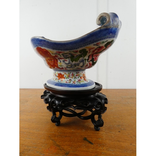 360 - A stunning large Chinese scroll dish on a wooden stand.