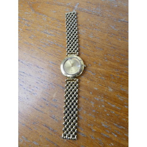 368 - A ladies replica Courreges watch.