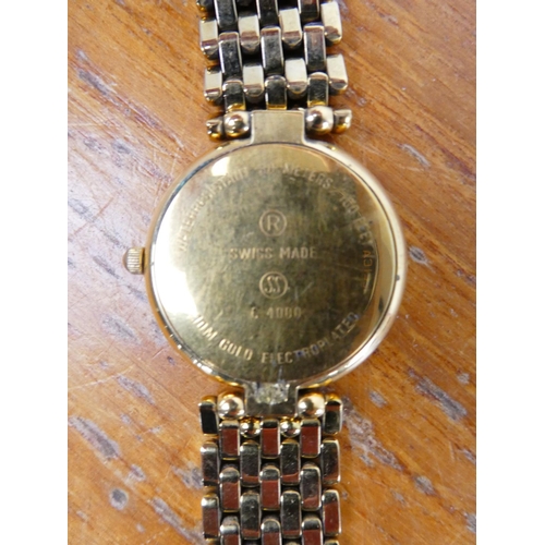 368 - A ladies replica Courreges watch.