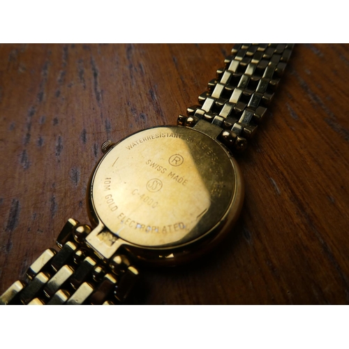 368 - A ladies replica Courreges watch.