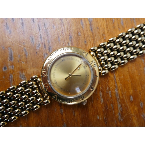 368 - A ladies replica Courreges watch.