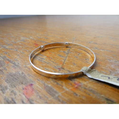 369 - A sterling silver child's bangle and ring.