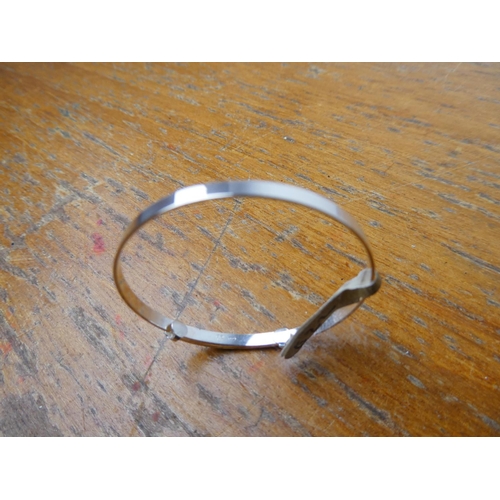 369 - A sterling silver child's bangle and ring.