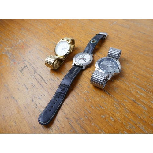 383 - A Kickers wrist watch and two others.