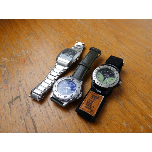 385 - A Zurich wrist watch and two others.