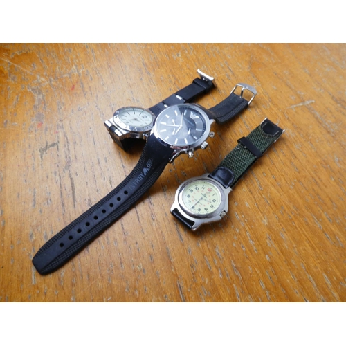 388 - An Armani replica wrist watch and two others.