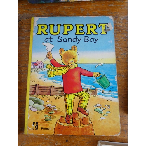 6 - A collection of vintage books to include Rupert at Sandy Bay, Tiger Annual 1960 and more.
