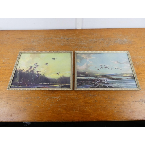 60 - A  pair of vintage framed Vernon Ward prints.