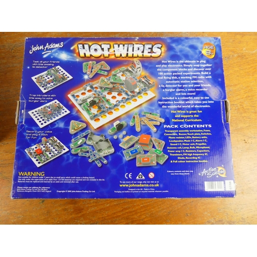 67 - A boxed Hot Wires game and a boxed Lego Robotics Discovery set.