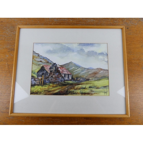 8 - A pine framed watercolour of a rural cottage signed.