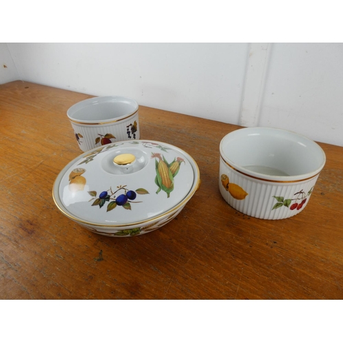 84 - A large Royal Worcester Evesham lidded dish and two others.