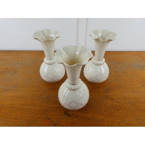 99 - A set of three Belleek pottery 'Rossmore' vases.