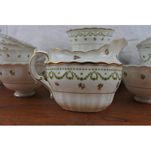 437 - An antique Crescent & Son tea set with floral pattern.