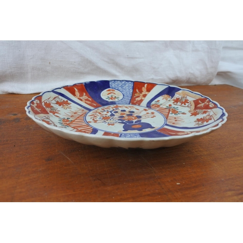 447 - A stunning antique Imari charger (a/f).