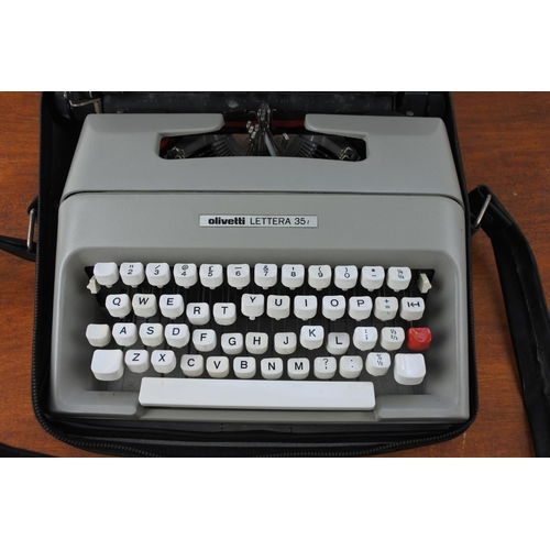 448 - A vintage Olivetti Lettera 35 typewriter and carry case.