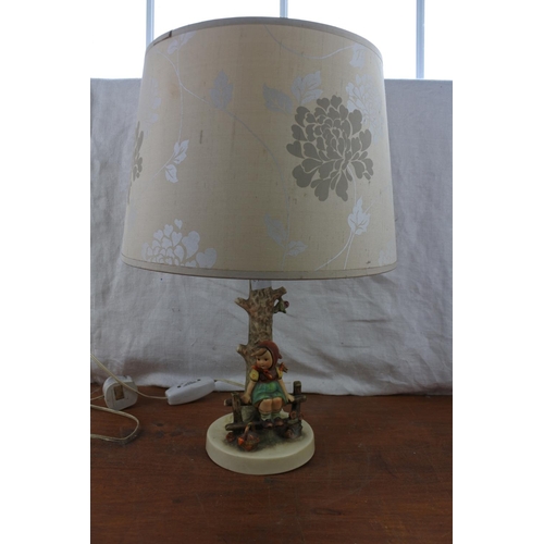 496 - A stunning Goebel Hummel figure table lamp and shade.