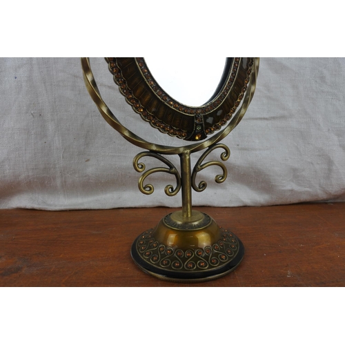 513 - A metal and coloured stone cheval table mirror.