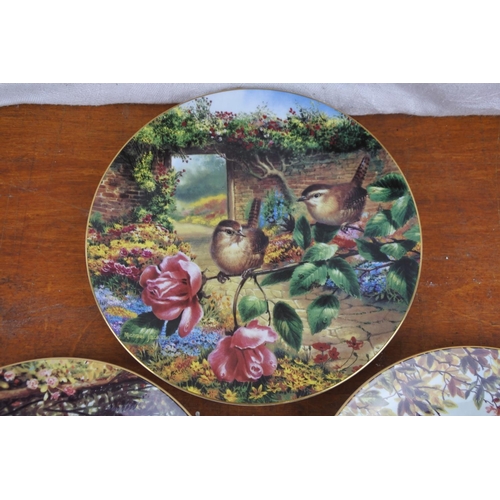 527 - Three Wedgwood 'Old English Gardens' collectors plates.