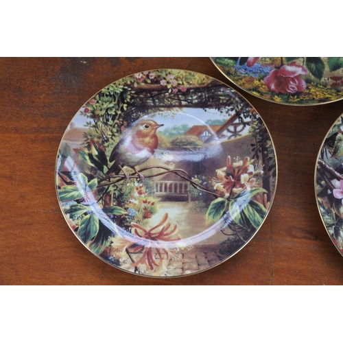 527 - Three Wedgwood 'Old English Gardens' collectors plates.