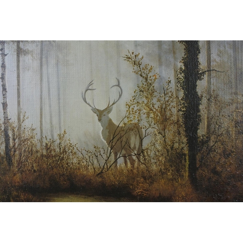 536 - A gilt framed picture of a Stag, measuring 21