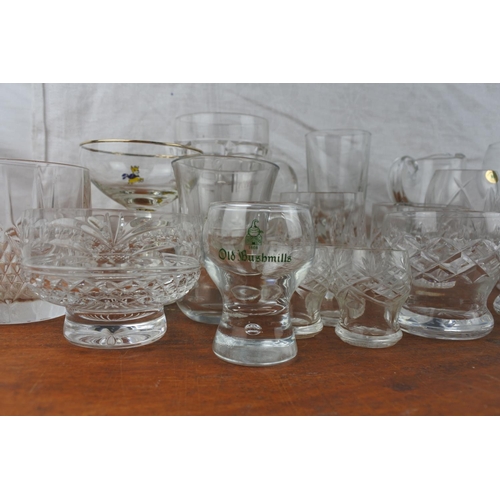 547 - A large collection of glassware to include Babycham glasses, a Harrods tankard, Tyrone crystal and m... 