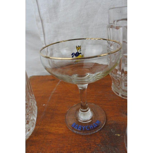 547 - A large collection of glassware to include Babycham glasses, a Harrods tankard, Tyrone crystal and m... 