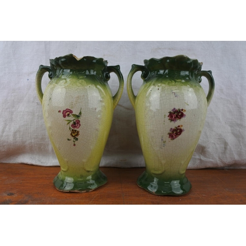 548 - A pair of antique vases (a/f).