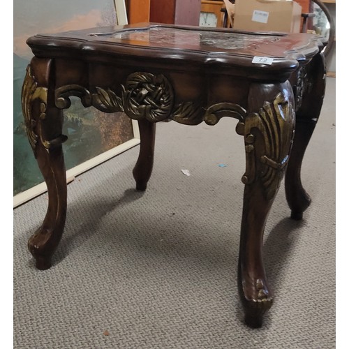 72 - A stunning mahogany occasional table with carved detail and a marble effect top, measuring 26