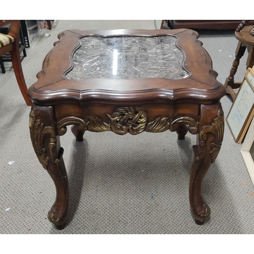 72 - A stunning mahogany occasional table with carved detail and a marble effect top, measuring 26