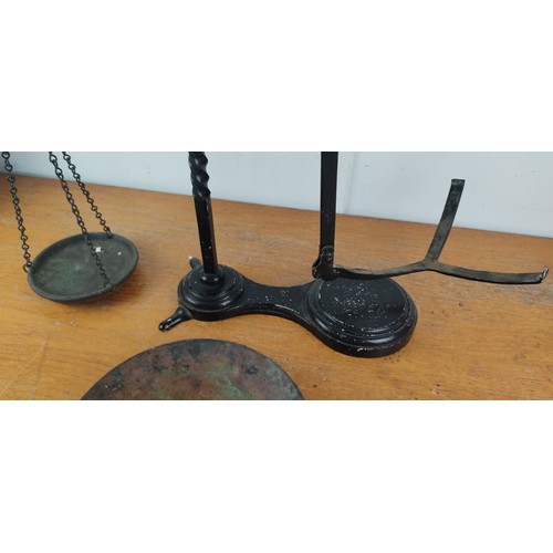 166 - A set of antique weighing scales.