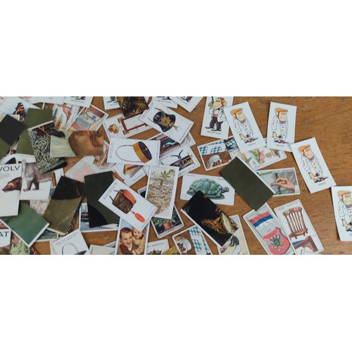 317 - A collection of vintage cigarette cards.