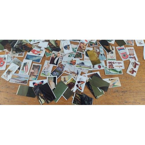 317 - A collection of vintage cigarette cards.