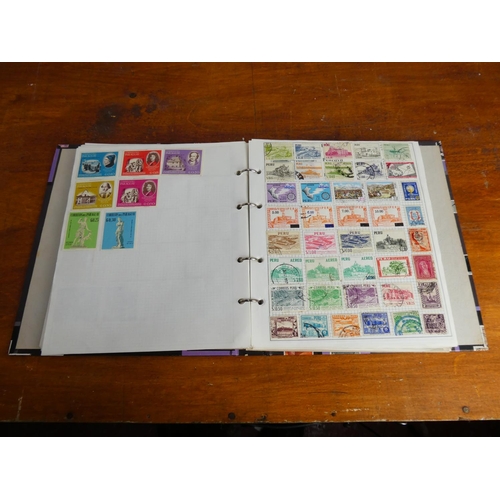 51 - A Stanley Gibbons 'Swiftsure' stamp album and contents (countries K -Z).
