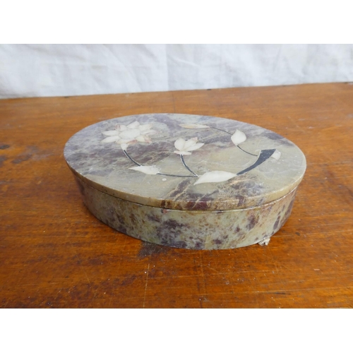 53 - A marble and mother of pearl trinket box.