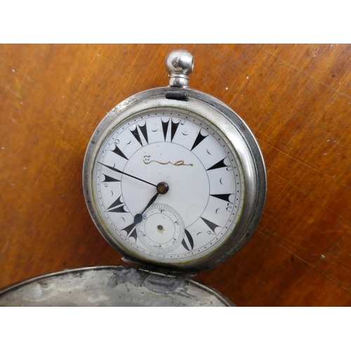 60 - An antique sterling silver pocket watch (a/f).