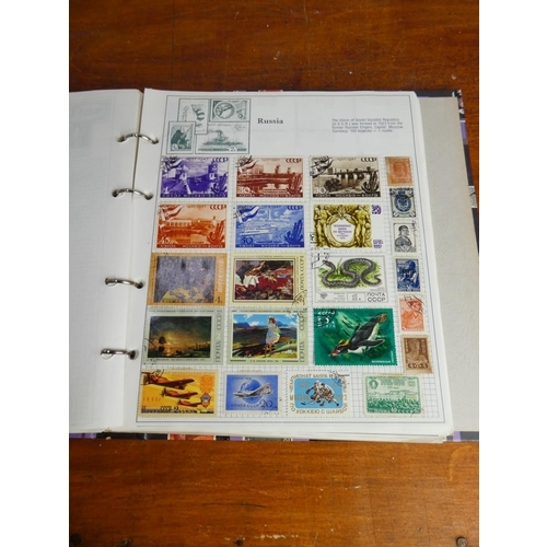 51 - A Stanley Gibbons 'Swiftsure' stamp album and contents (countries K -Z).