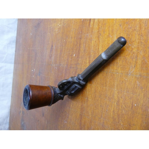 19 - An antique novelty Bakelite pipe, formed as a revolver/ pistol.