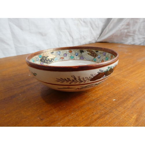 46 - A decorative Japanese/ Oriental bowl with seal to base.