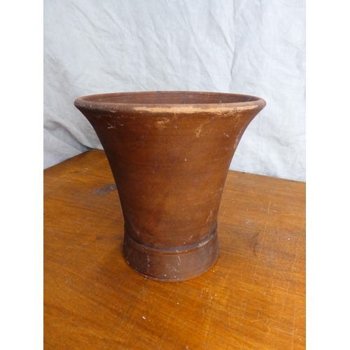 7 - A terracotta flower pot.