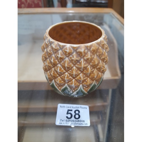 58 - An unusual Royal Doulton pineapple pot.