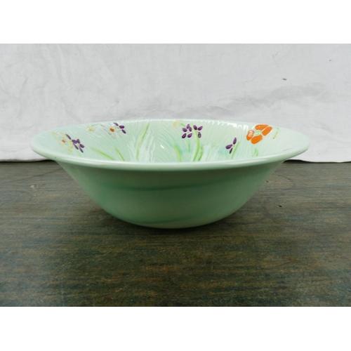 107 - A Beswick bowl with floral pattern.