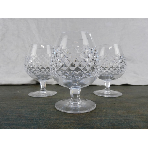 111 - Three Waterford crystal brandy glasses.