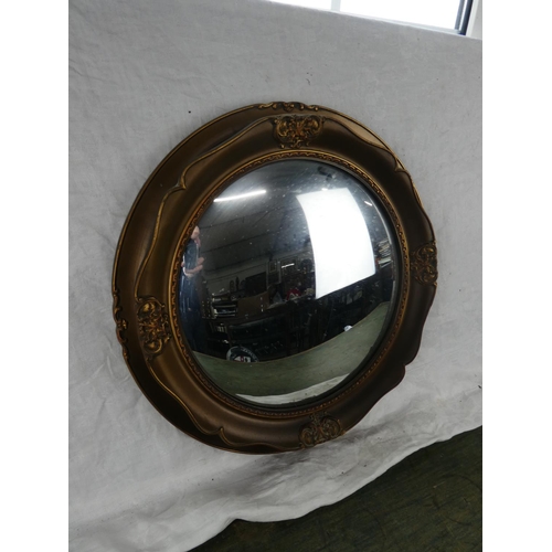 121 - A circular framed 'butlers' wall mirror.