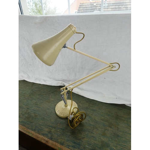 124 - A vintage Herbert Terry angle poise lamp.