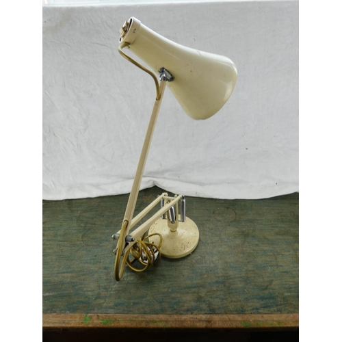 124 - A vintage Herbert Terry angle poise lamp.